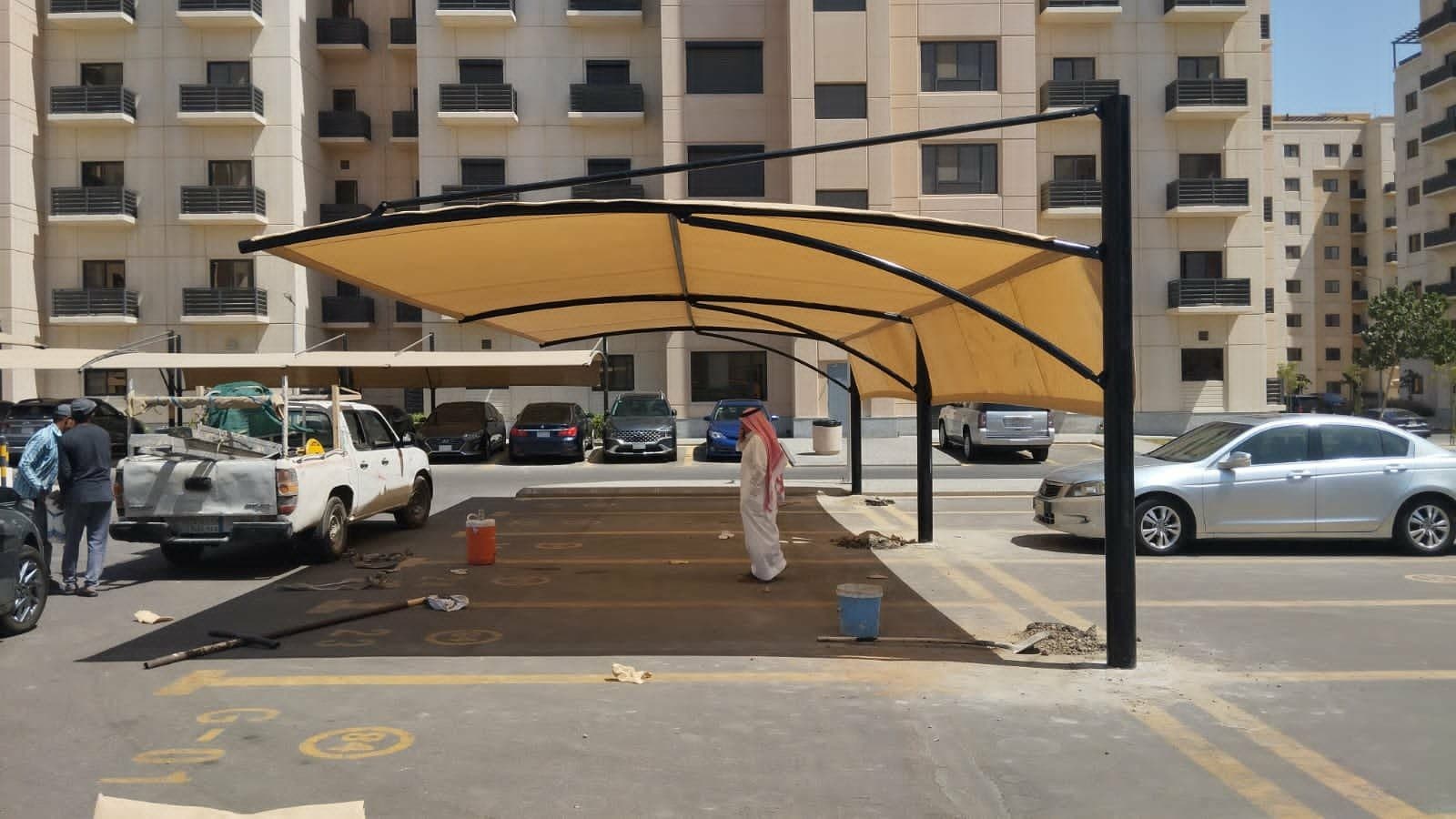 تركيب مظلات مقوسه مواقف الرياض في الرياض — مظلات مقوسة